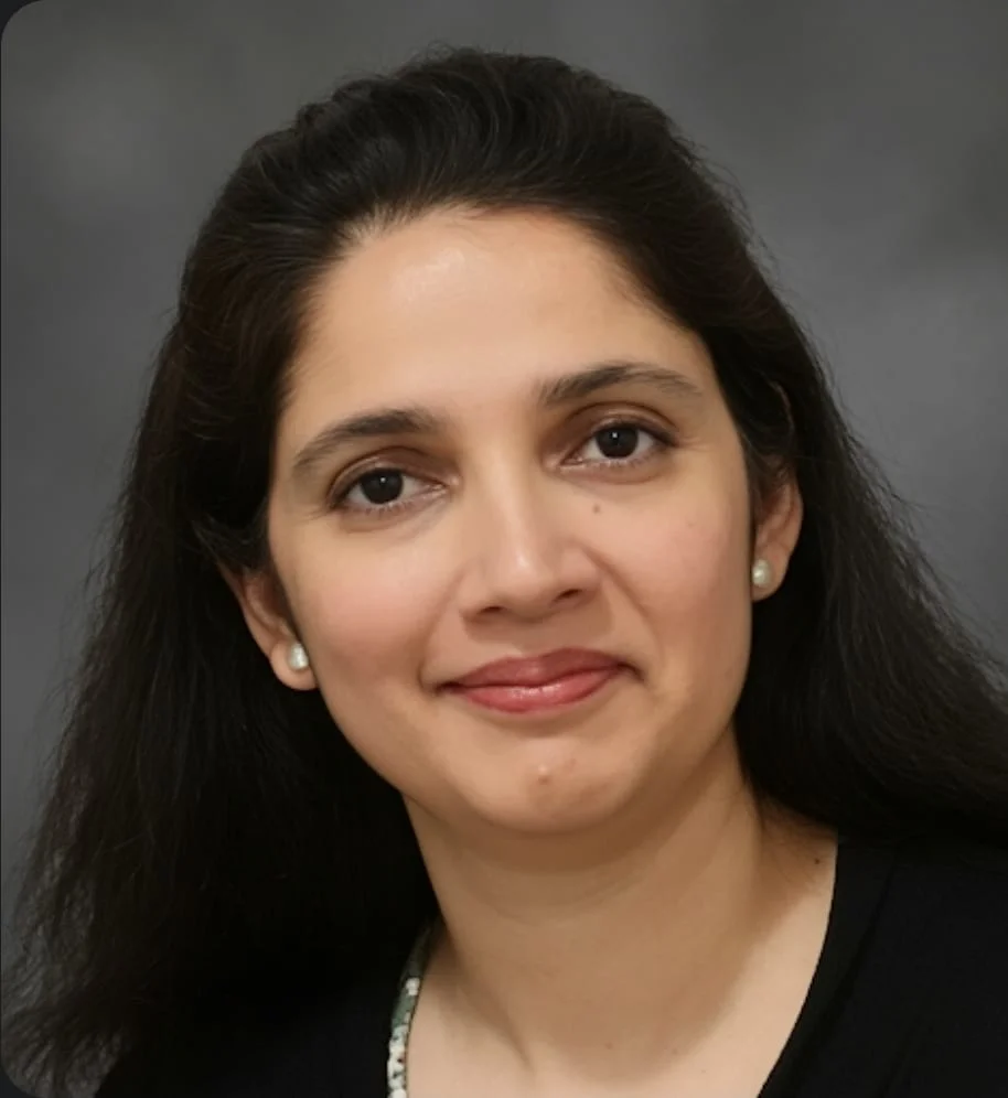 Headshot of Uzma Hassan